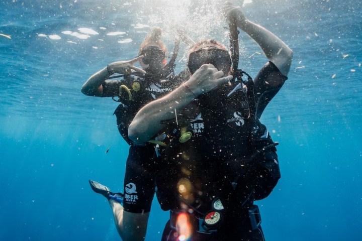 a person swimming in a body of water